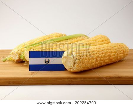 El Salvadoran Flag On A Wooden Panel With Corn Isolated On A White Background