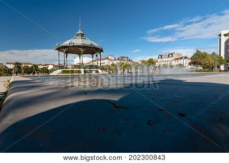 Beautifully architectural music tent with traditional forged ironwork and graceful details. Cultural center of the park in the city