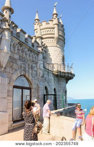 Yalta, Crimea - 11 July, People at the castle, 11 July, 2017.
Small Castle Lastochkino Nest and its surroundings.