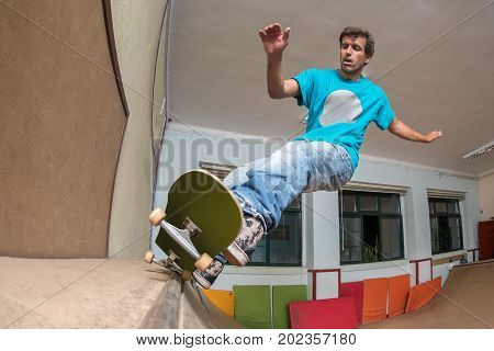 Skateboarder Performing A Trick