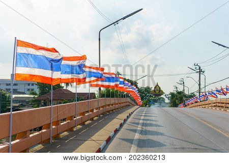Close Up Thai Flags On The Pole Blown By Wind In Sunny And Cloudy Day.