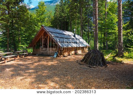 Mountain cabin, hut, Charcoal Burner House in European Alps, located in Robanov kot, Slovenia, popular hiking and climbing place with picturescue view