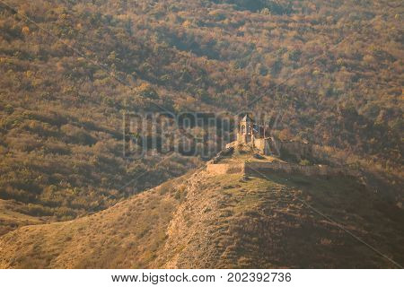 Gori, Shida Kartli Region, Georgia. St. George's Church In Autumn Morning Dawn. Travel Destination Gorijvari Church.