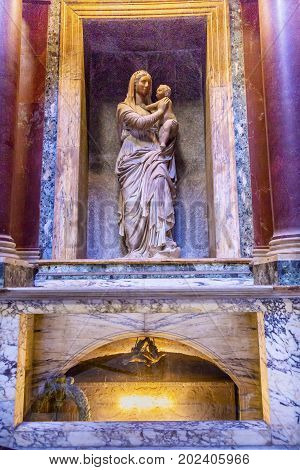 ROME, ITALY - January 19, 2017 Raphael's Tomb Mary Jesus Statue Pantheon Rome Italy Rebuilt by Hadrian in 118 to 125 ADthe Second Century Became oldest Roman church in 609 AD. Raphael the Great Artist died in 1520 and asked to be buried in the Pantheon