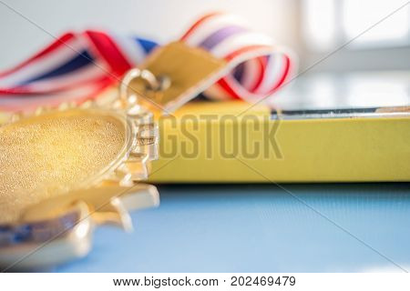 Golden medals on book graduate education in university Competitions and Education study concepts. Success in study famous institution Concept of winner abroad international.