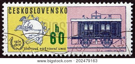CZECHOSLOVAKIA - CIRCA 1974: a stamp printed in Czechoslovakia shows Railroad Mail Coach circa 1974