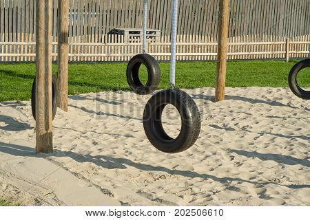 Swing of the tire on the chain of children's swing