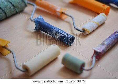 Set of instruments for making repair on wooden background in details