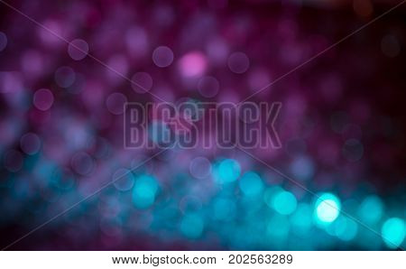 Festive Beautiful abstract Background with bokeh lights. Holiday Texture defocused. Can be used as Wallpaper filling for a website