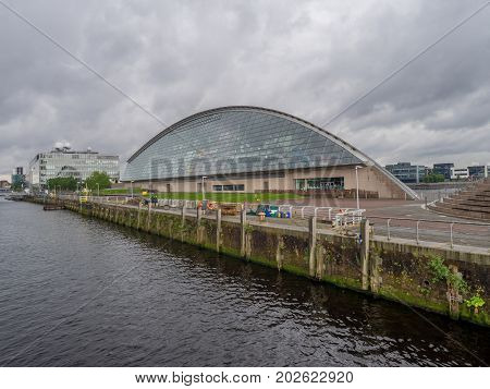 GLASGOW SCOTLAND - JULY 22: The Glasgow Science Centre along the River Clyde on July 22, 2017 in Glasgow Scotland. The Science Centre is a popular Glasgow attraction.