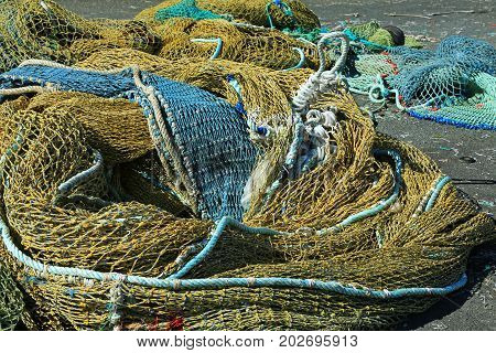 Fishing nets in the port of Loctudy Finistere Brittany France spread to dry