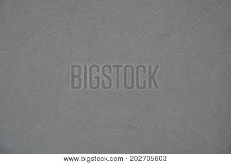 photo of a grey wall texture background.