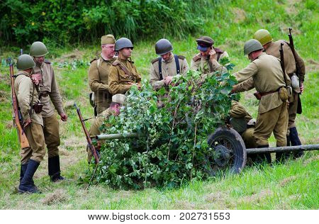 Soldiers with artillery.The VIII International Festival of Military History and remake for the battle `1944` 6.08.2016 in Valga, Estonia