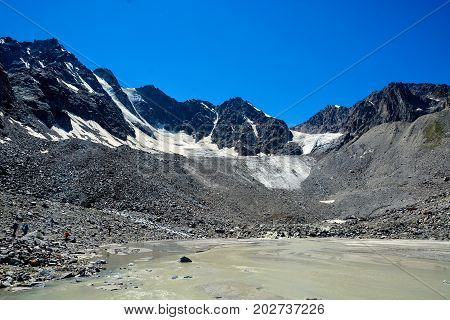 River and waterfall in forest, mountains of Caucasus, Russia.