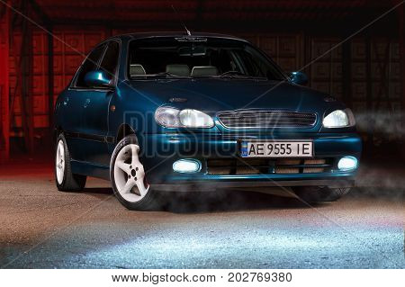 KRIVOY ROG UKRAINE - AUG 19 - Daewoo Lanos with lights on at night Saturday 19 August 2017