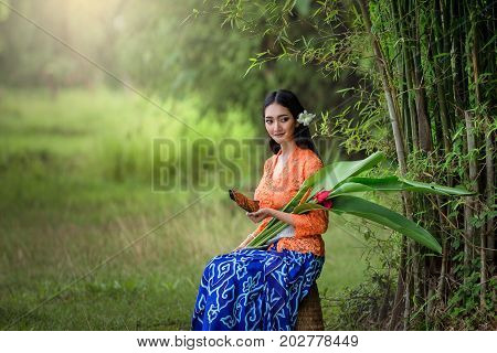 Woman waering indonesia traditional dress portrait concept.