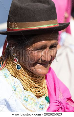 July 1, 2017 Cotacachi, Ecuador: on Punchi Warmi day the Kichwa indigenous women will dress up in traditional wear and dance in the main square of the town