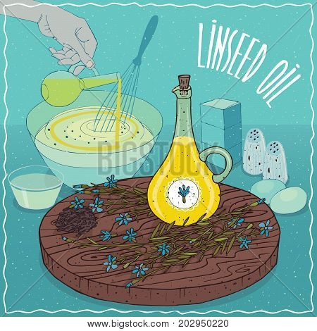 Glass Pitcher of Linseed oil and flowers and seeds of Flax plant. Hand pouring oil into bowl. Natural vegetable oil used for cooking