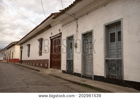 July 6, 2017 Buga, Colombia: white wash architecture is one of the main attraction points for tourists of one of the oldest colonial towns in the country