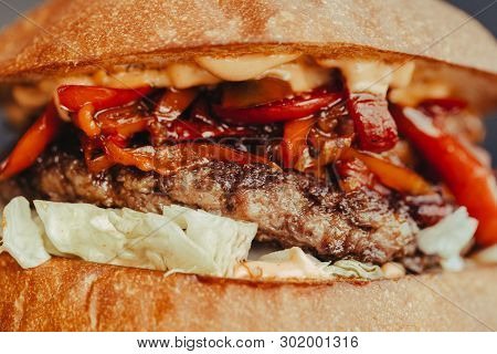 Burger Flyer. Cheese Burger With Grilled Meat, Cheese, Salad And Onion Rings. Close-up Of Delicious 