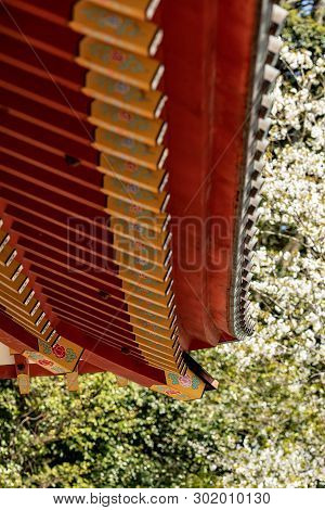 Japanese Traditional Architecture. The Elegant Construction Of The Japanese Temple Of Red And Gold B