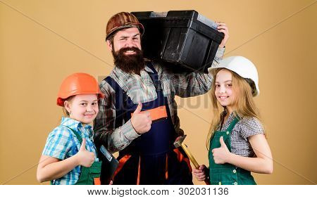 Informal Education. Fathers Day. Sisters Help Father Builder. Our Dad Has Skillful Fingers. Home Ren
