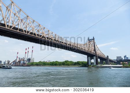 An image of the Queensboro Bridge and the Ravenswood power plant