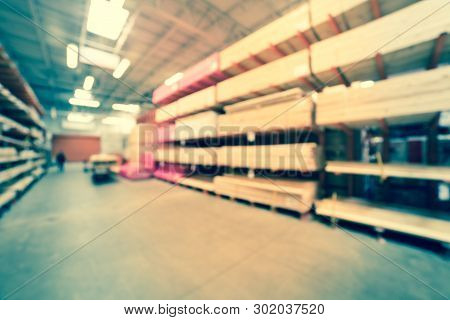 Filtered Image Blurry Background Lumber Stacks On Shelves At American Hardware Store