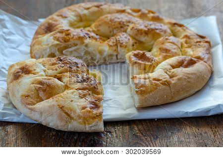 Slices Of Ramadan Pita (ramazan Pidesi) Traditional Turkish Bread For Holy Month Ramadan On Wooden B