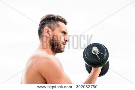 Man Sportsman Weightlifting. Steroids. Fitness And Sport Equipment. Muscular Man Exercising In Morni