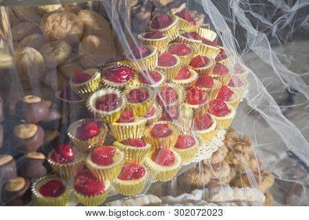 Wedding Day Cookie Table Covered By Veil With Buckeyes And Cheesecake Bites Among Other Baked Goods