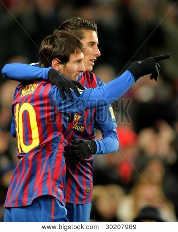 BARCELONA - 4 de FEB: Leo Messi con Cristian Tello del FC Barcelona celebran el gol durante Busti Español