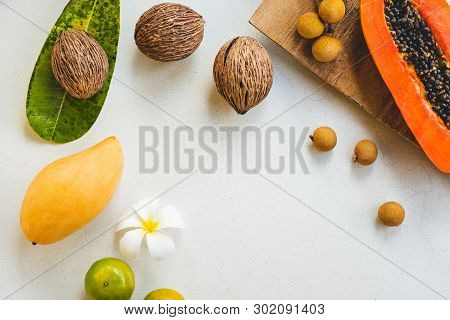 Frangipani, Lychee, Coconut, Papaya, Lime, Mango On Marbel Background. Flat Lay, Top View, Copy Spac