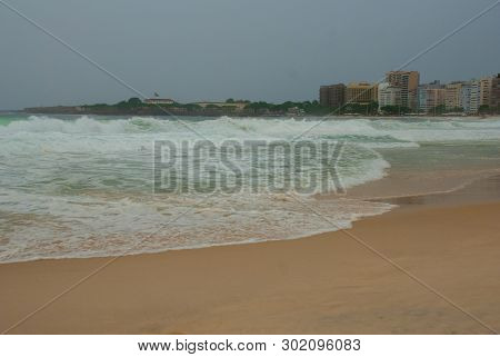 Rio De Janeiro: The Most Famous Beach, Copacabana Beach In Cloudy Weather. Brazil