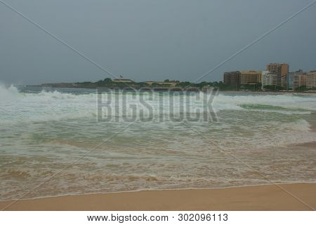 Rio De Janeiro: The Most Famous Beach, Copacabana Beach In Cloudy Weather. Brazil
