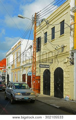 Virgin Islands, Usa - Jun 2, 2014: Historic Building On Dronningens Gade At Palm Pasg In Downtown Ch