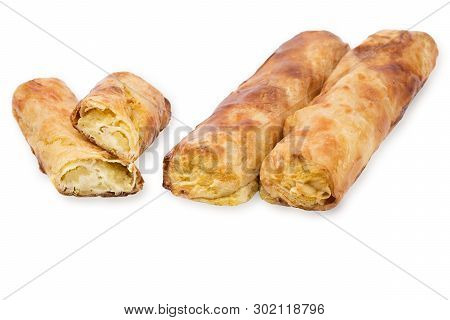 Baking Puff Pastry With Potatoes And Mushrooms, One Pastry In The Cut.