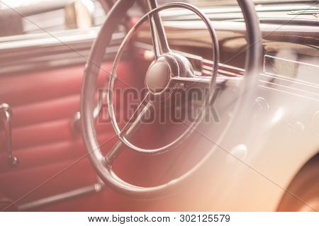 Classic Vintage Car Interior, Close Up On Steering Wheel, Dasboard, Retro Effect