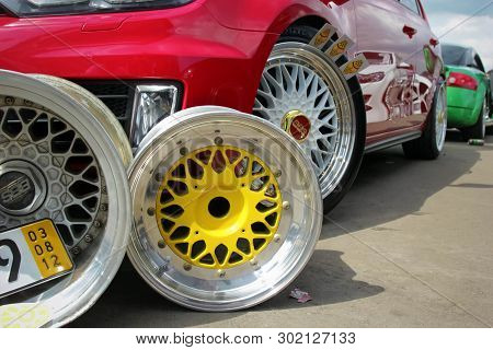 Moscow. Russia - May 20, 2019: Colorful Bbs Wheels Near Red Tuned Hatchback Which Parked On The Stre