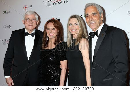 LOS ANGELES - MAY 19:  Phil Donahue, Marlo Thomas, Ann Souder, Tony Thomas at the American Icon Awards at the Beverly Wilshire Hotel on May 19, 2019 in Beverly Hills, CA