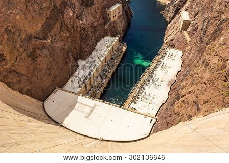 Hoover Dam, A Concrete Arch-gravity Dam Located On The Nevada And Arizona Border, A Top Tourist Attr