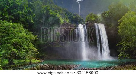 Twin Waterfall Rain Forest In Valley Like A Paradise Garden With Turquoise Green Pond And Blur Water