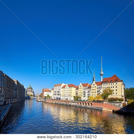 Riverside With Old Houses In Nikolaiviertel, Historical Part Of Mitte In Berlin, Germany. Panoramic 