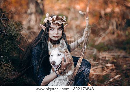 Beautiful Elf Woman Fabulous, Fairy Forest, Famtasy Young Woman With Long Ears, Long Dark Hair Golde