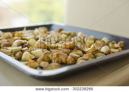 Roasted Potatoes Close Carlic Clovesin The Trey