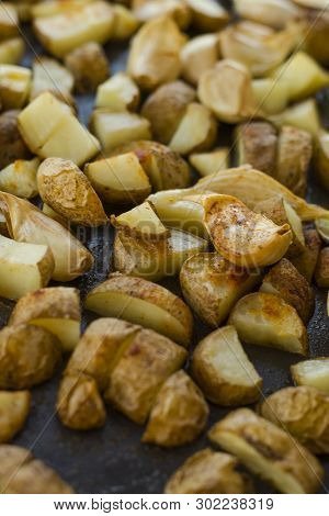 Roasted Potatoes Close Carlic Clovesin The Trey