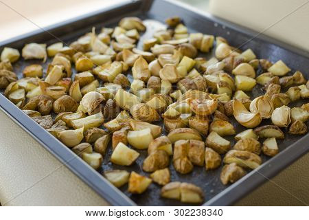 Roasted Potatoes Close Carlic Clovesin The Trey