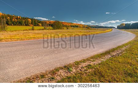 The Highway Through The Autumn Wood In Sunny Day, Mari El, Russia, 88k-002