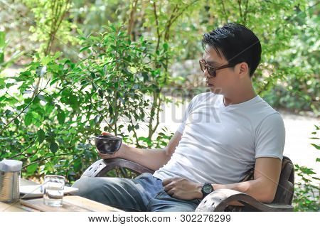Unaware Man Or A Man Is Drinking Coffee