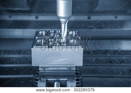 The  Operation Of Cnc Machining Centre Cutting The Mould Parts .the Cnc Milling Machine Rough Cuttin